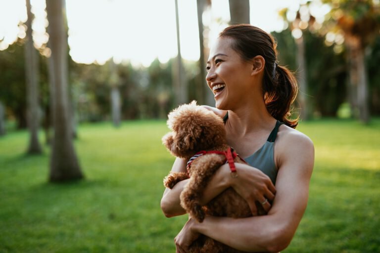 Menlo Park Skin Care model holding dog