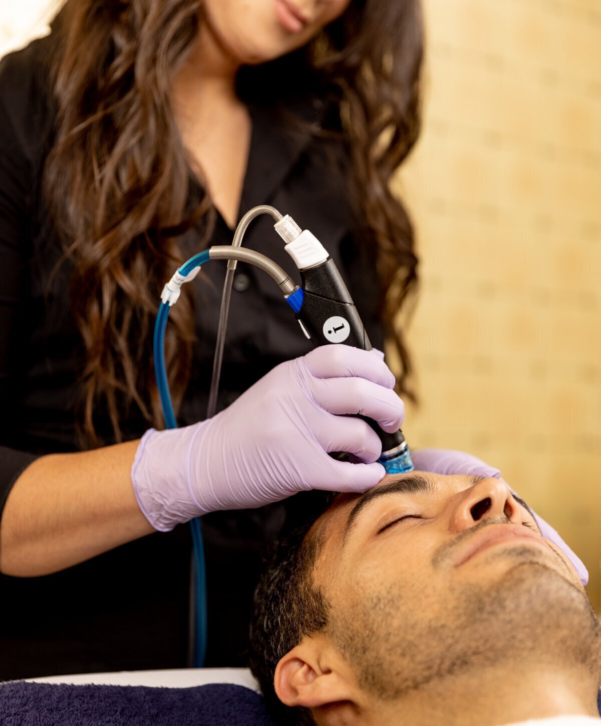 San Jose HydraFacial client receiving treatment