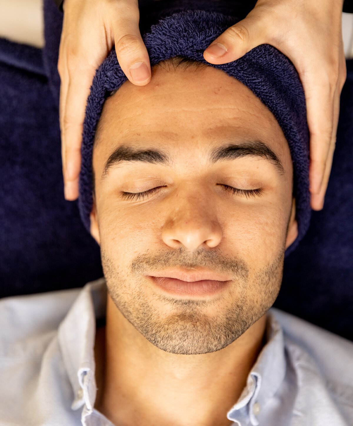 Male client receiving Palo Alto skin rejuvenation treatment