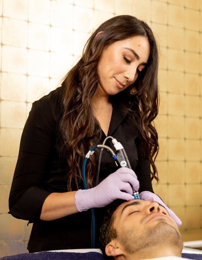 Palo Alto MedSpa expert delivering skin treatment at Total Glow